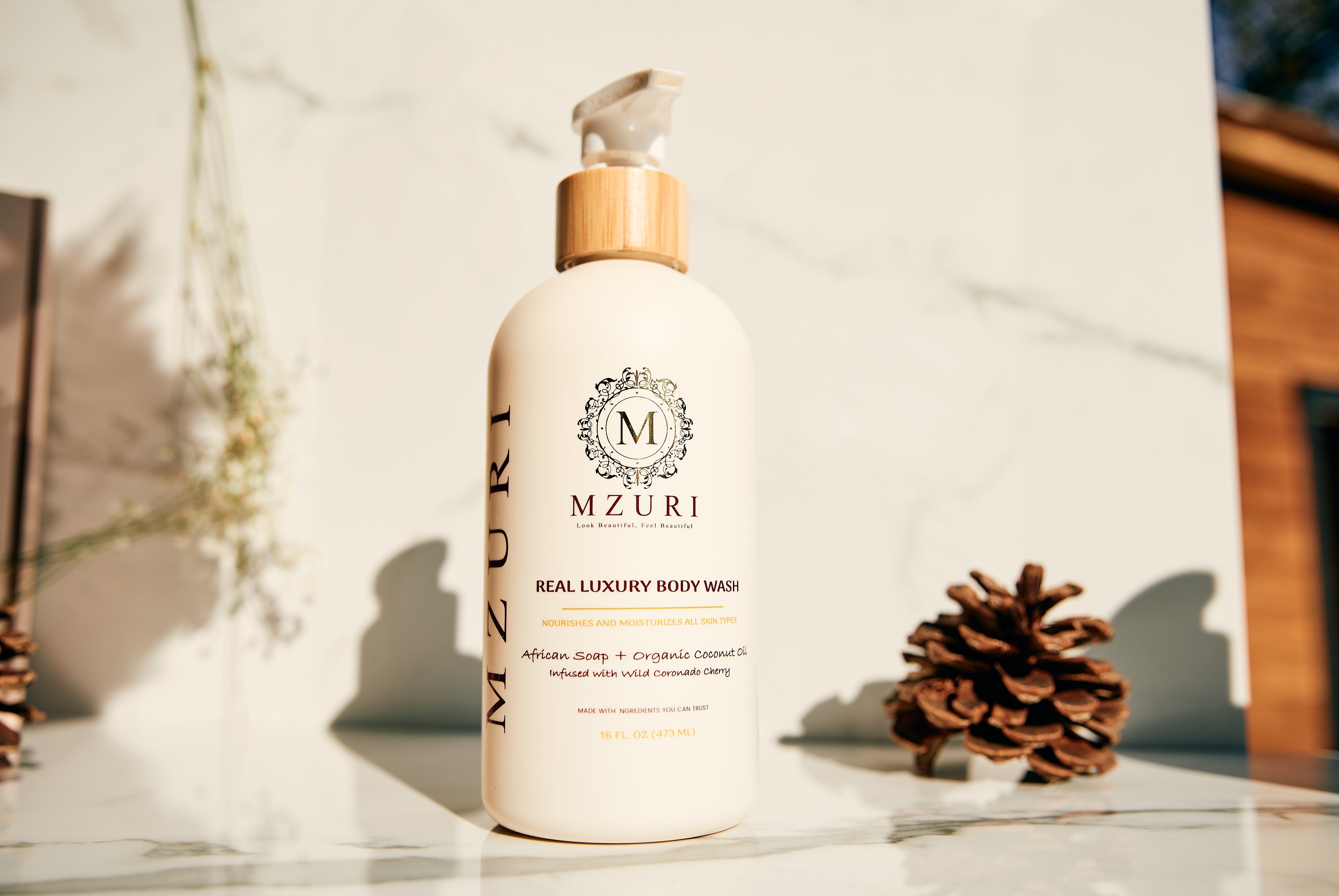 Mzuri Coconut Oil Body Wash bottle front